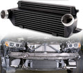 Front-mount intercooler kit with black finned core and two metal inlet/outlet pipes