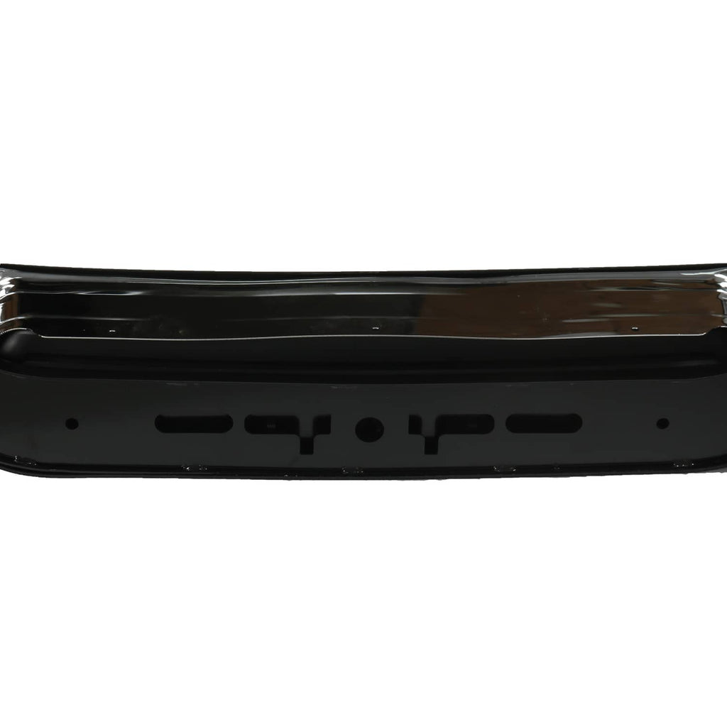 Rear bumper backing panel, black with mounting slots and chrome trim edge
