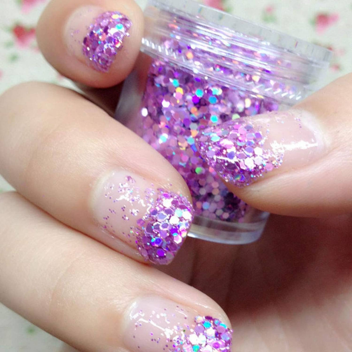 Purple chunky glitter on fingernails with iridescent hex flakes