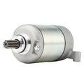 Starter motor with silver housing and front splined drive shaft, mounting ear and bolts visible