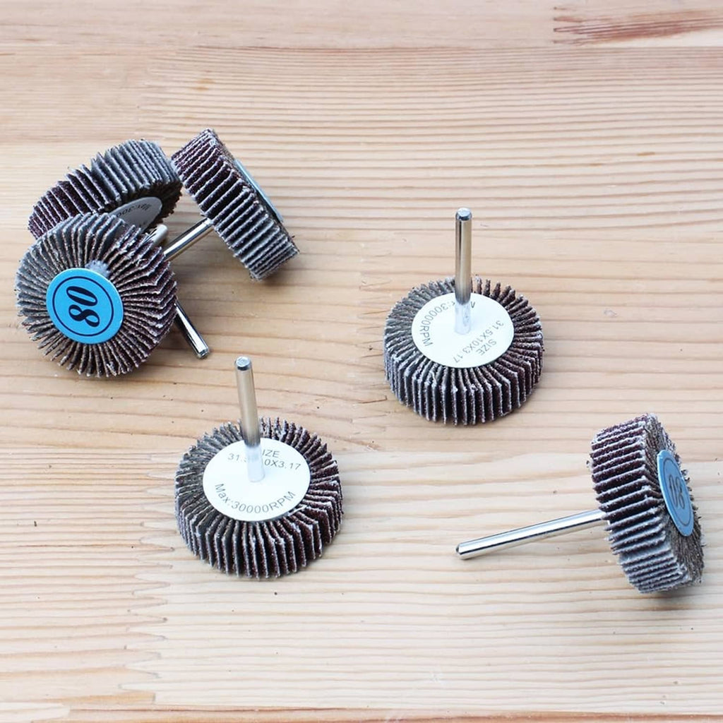 Flap sanding wheels with 80-grit discs and central metal shanks for drills
