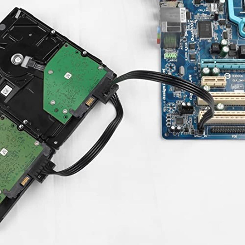 SATA 15-pin power splitter cable connected to a motherboard, black