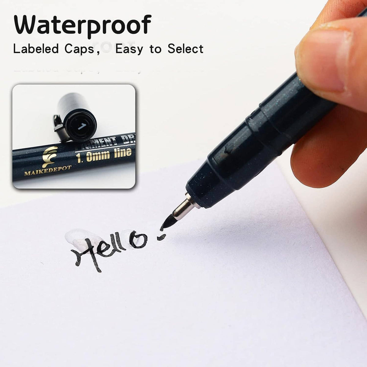 Waterproof needle drawing pen with labeled cap, hand writing on paper