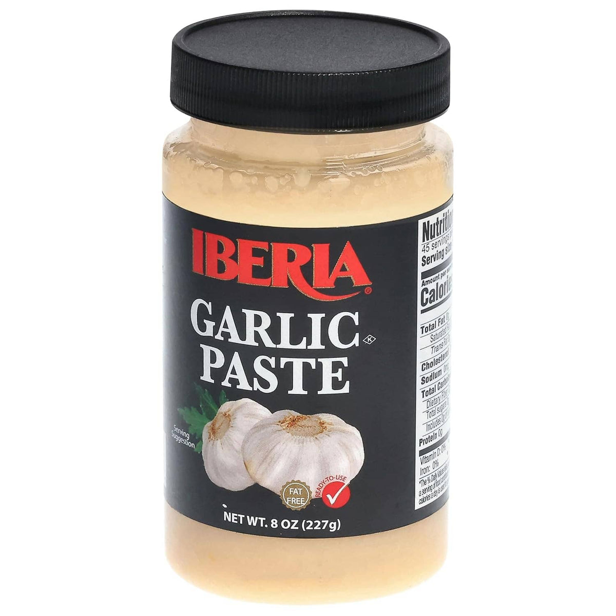 Garlic paste jar with black lid and side nutrition label visible.