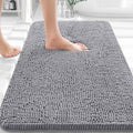 Grey chenille bathroom rug with dense pebble-like pile
