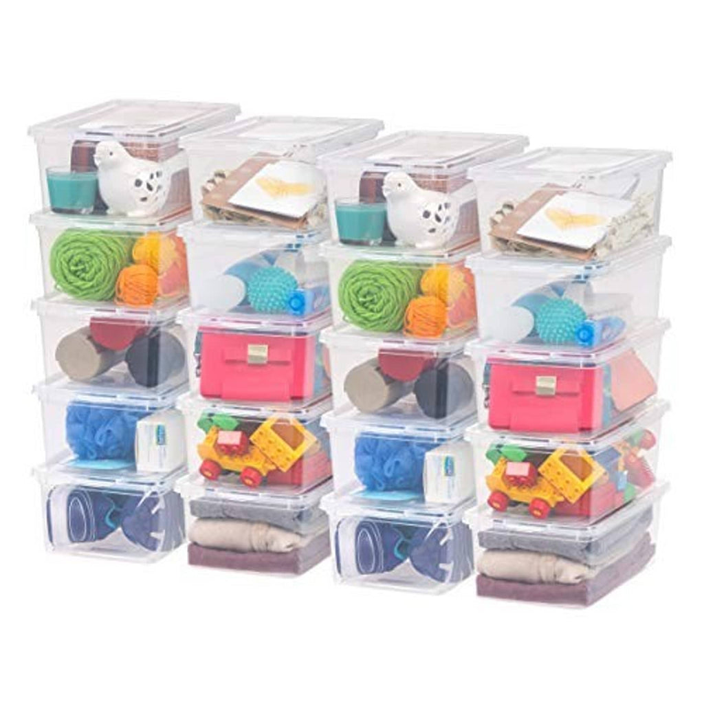 Set of clear plastic storage bins with lids, stacked and filled with folded goods