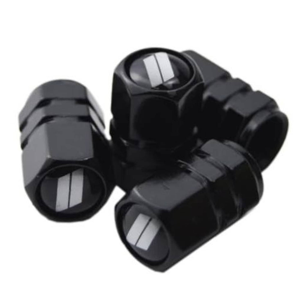 Set of four black tire valve stem caps with silver slash inserts, metal-look trim