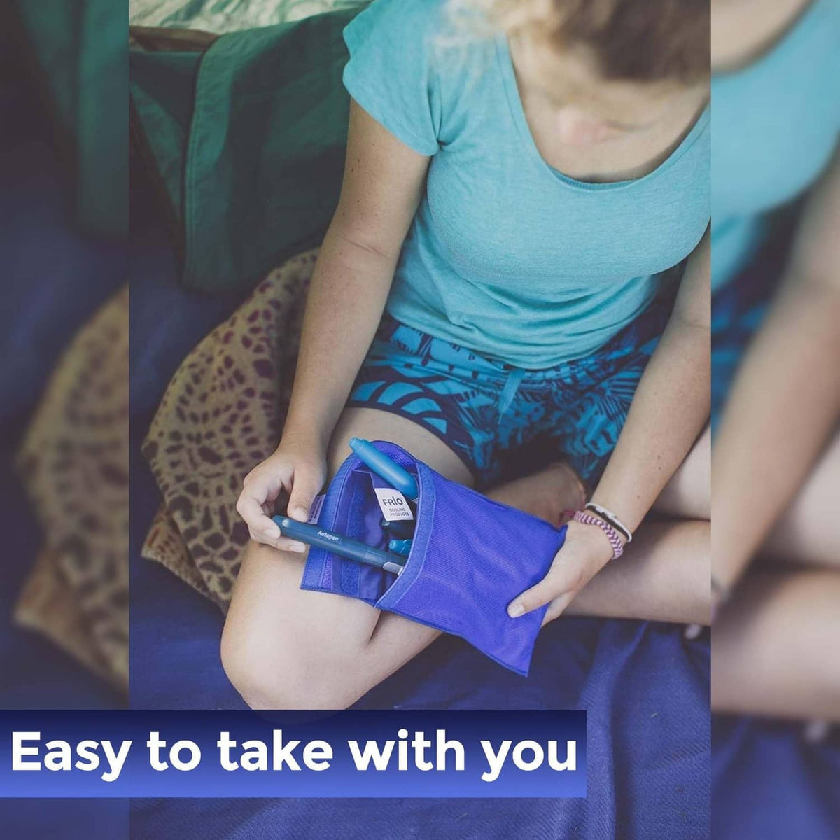 Blue FRIO cooling wallet pouch being carried in a hand