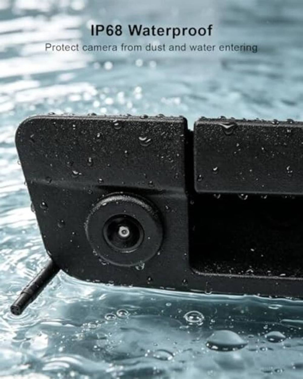 Waterproof tailgate handle backup camera with black housing and visible lens, wet surface