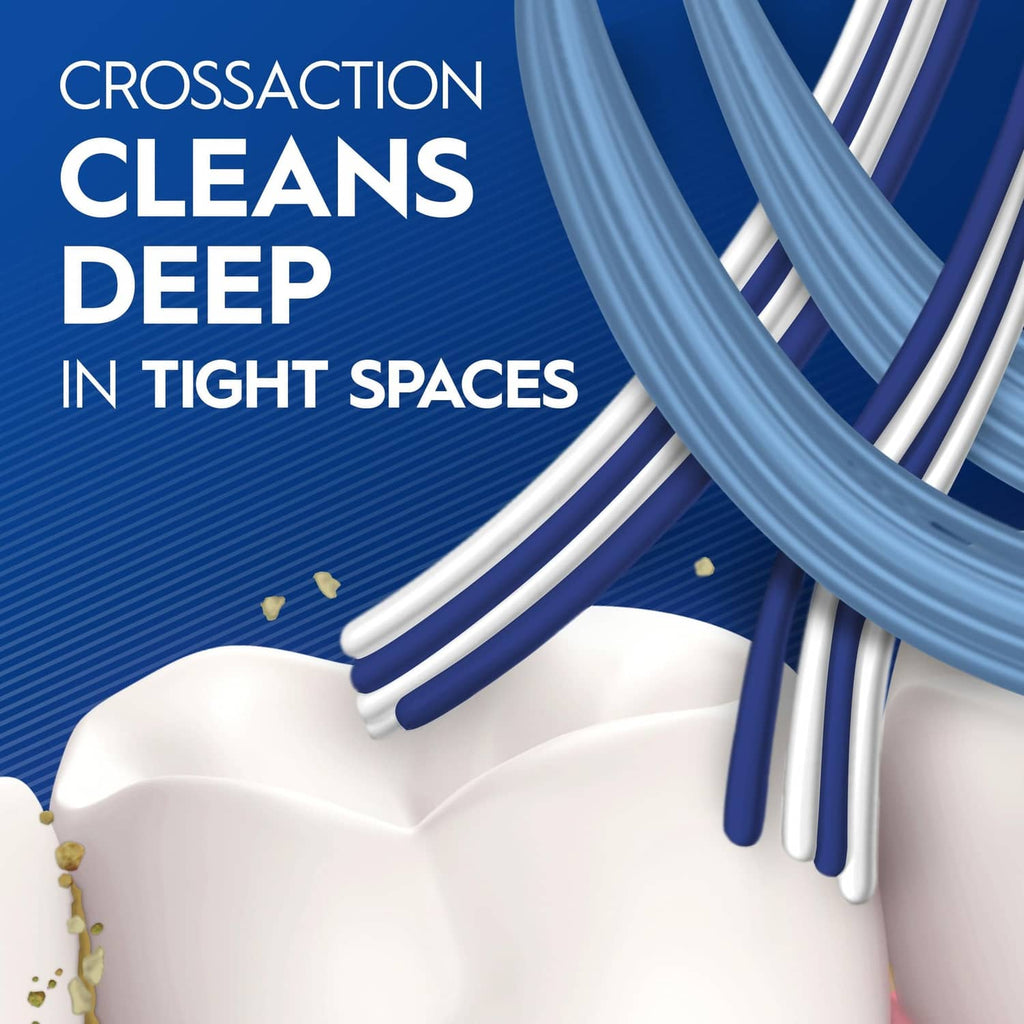 Toothbrush head with curved blue bristles, designed for tight spaces