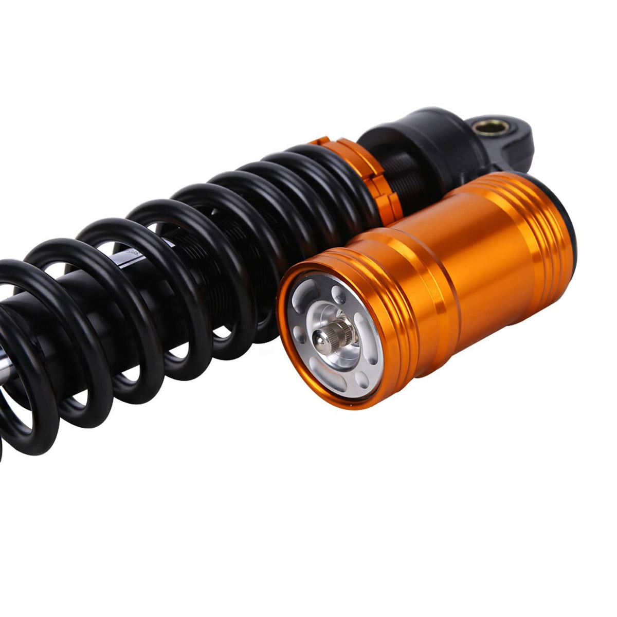 Close-up air shock absorber with black coil spring and orange-gold cylinder body