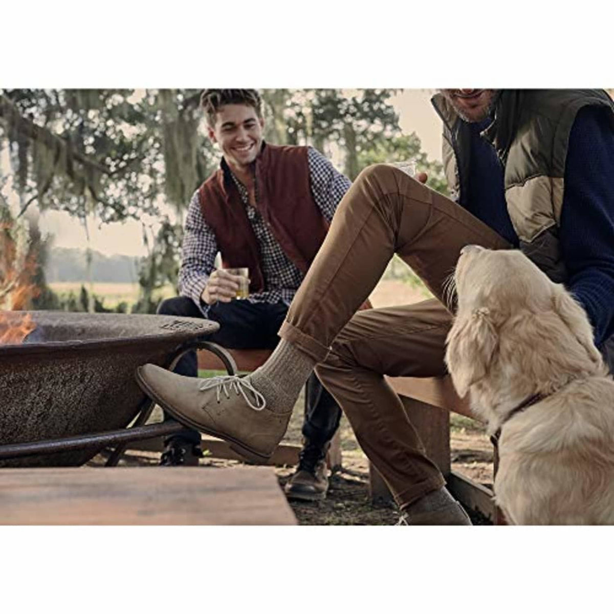 Tan crew socks on a seated outdoor wearer, ankle-length visible