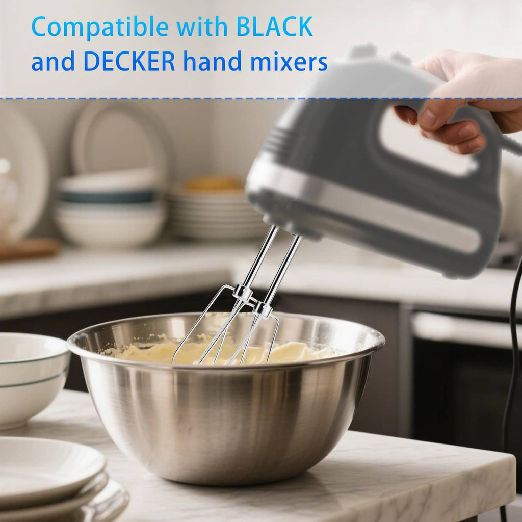 Stainless steel hand mixer beaters with wire whisk heads mixing in a metal bowl