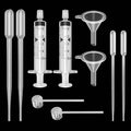 Plastic perfume refill tool kit with measuring syringes, funnels, and transfer tube