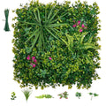 Artificial greenery square wall panel with assorted leafy plants and small pink flowers