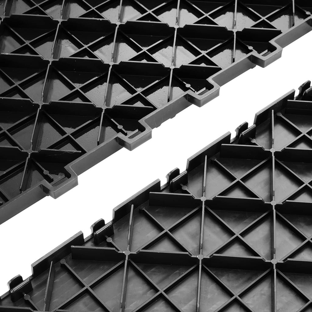Close-up of black tile underside showing grid pattern and interlocking tabs
