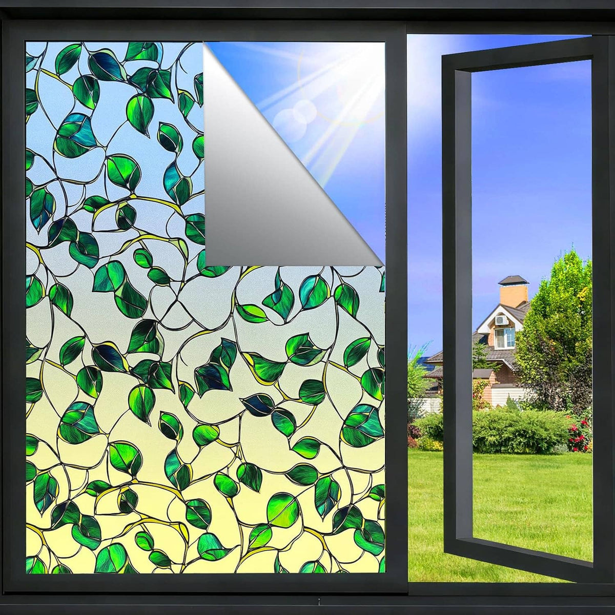 Stained-glass window privacy film with green leaf pattern on large double panes.