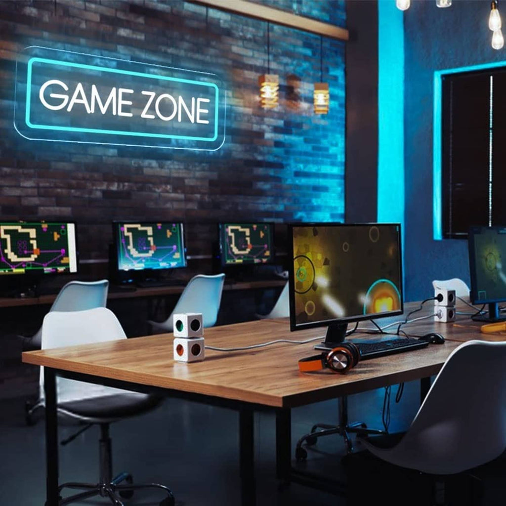 Wall-mounted GAME ZONE neon sign with blue border and white lettering
