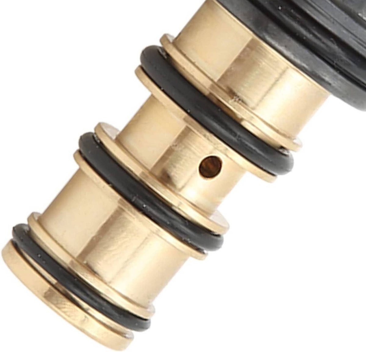Close-up of A/C control valve end with brass rings and black seal