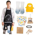 Black dad apron with front pockets and novelty graphic, worn with shirt and pants