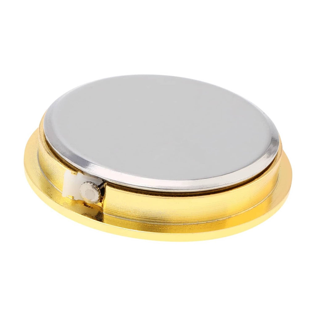 Mini quartz clock underside with gold base ring and silver circular cover