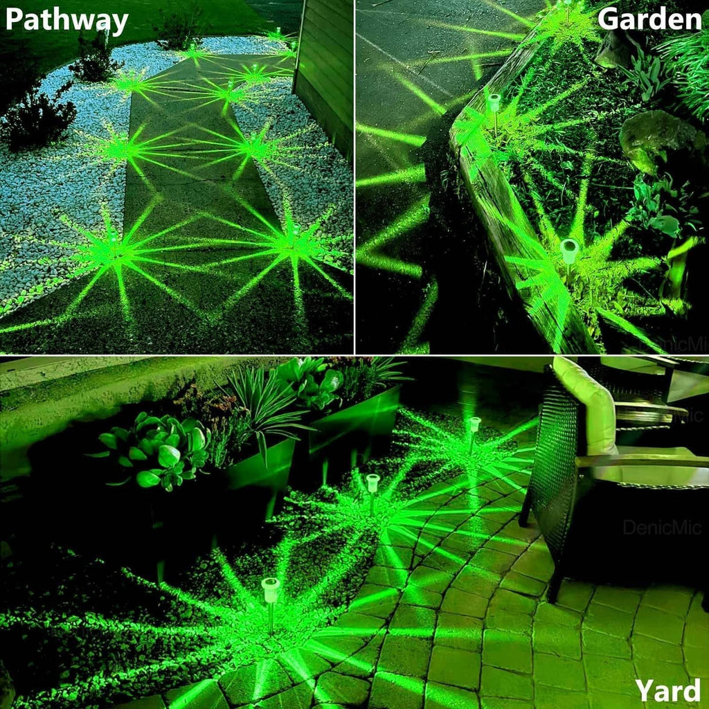 Green solar pathway lights casting starburst light patterns across grass and walkway