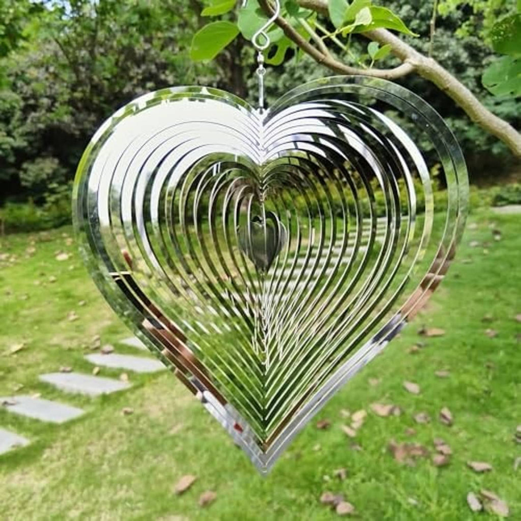 Heart-shaped garden wind chime spinner hanging from a metal loop
