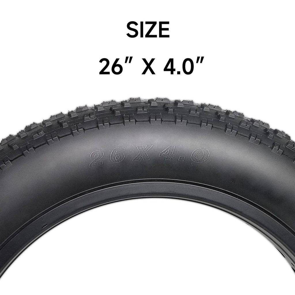 Black 26x4.0 fat bike tire close-up showing tread and sidewall profile