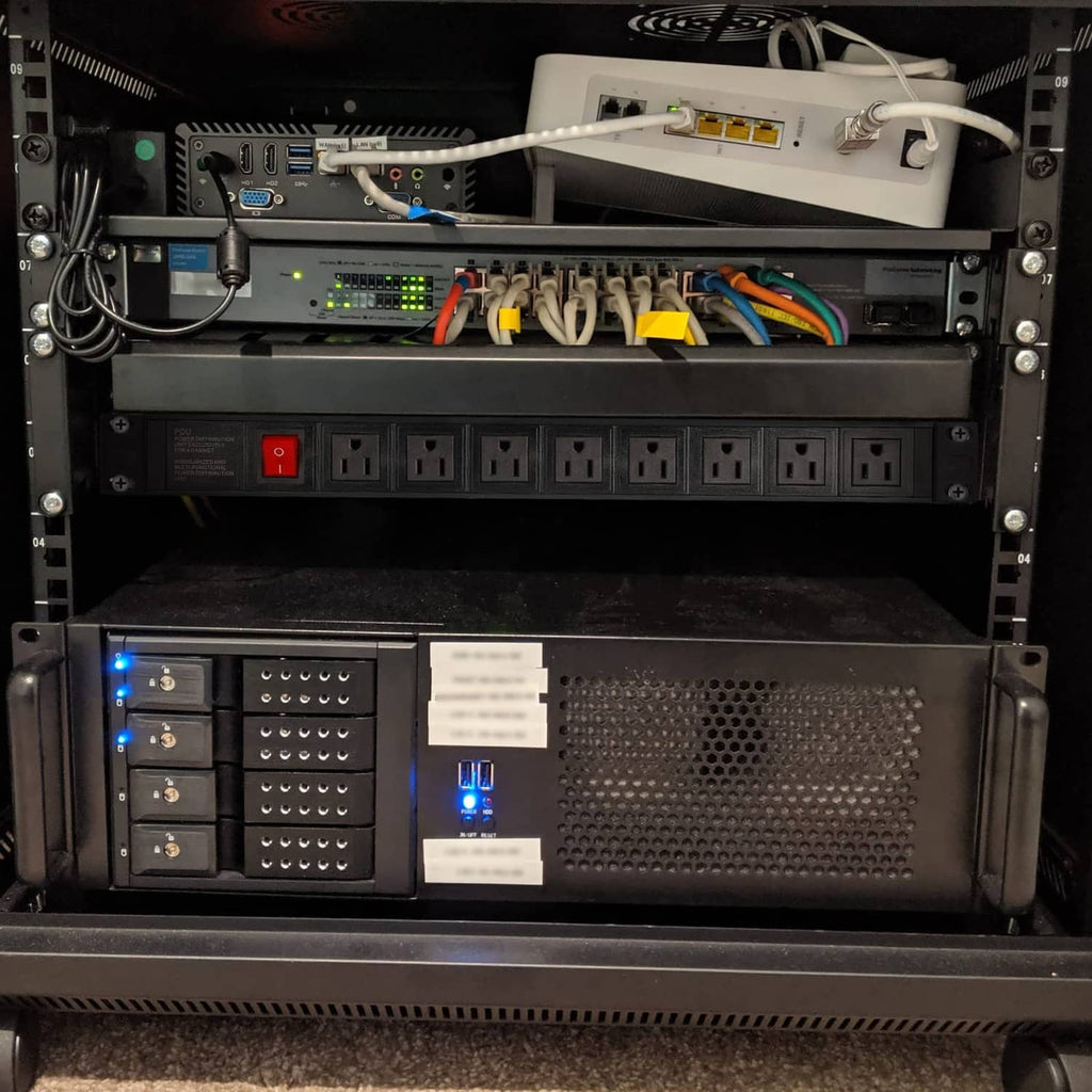 Rack-mounted power distribution unit with front outlets and internal components