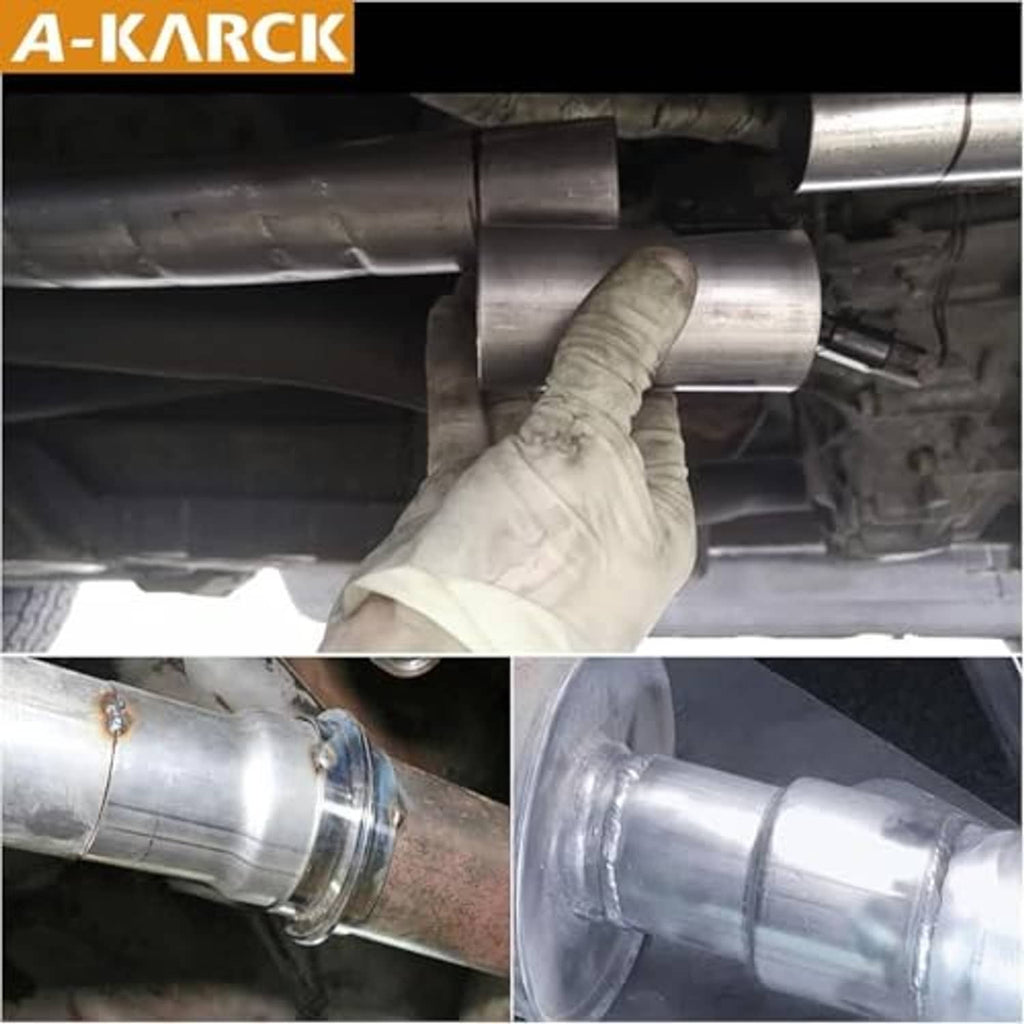 Mechanic glove holding stainless exhaust reducer connector beneath vehicle