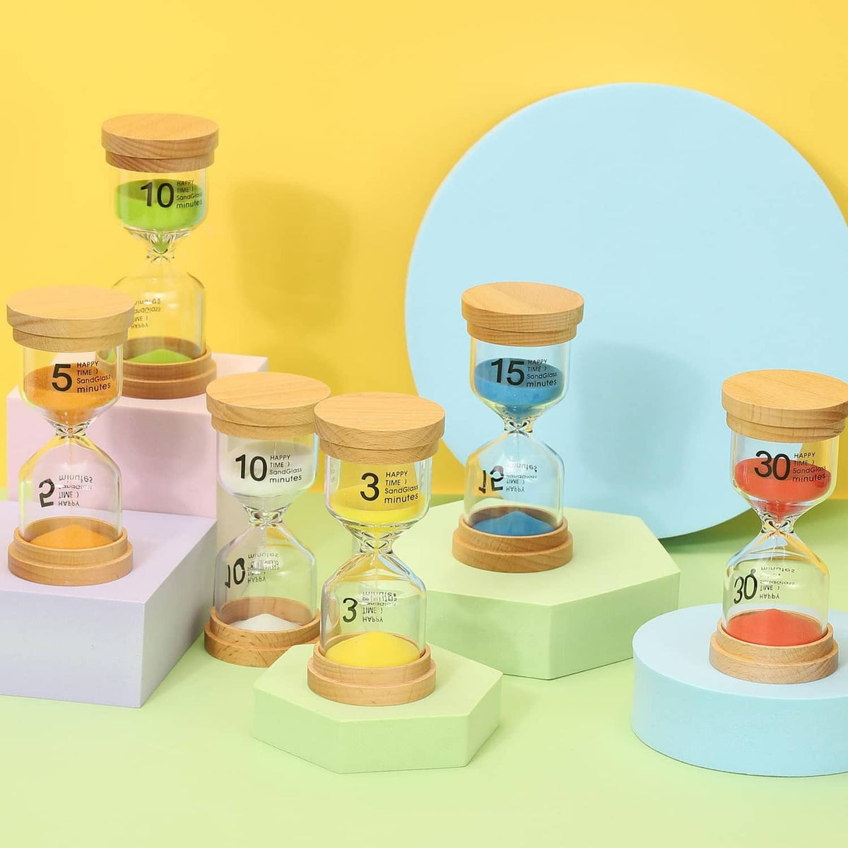 Assorted wooden sand timers with different minute markings in clear glass