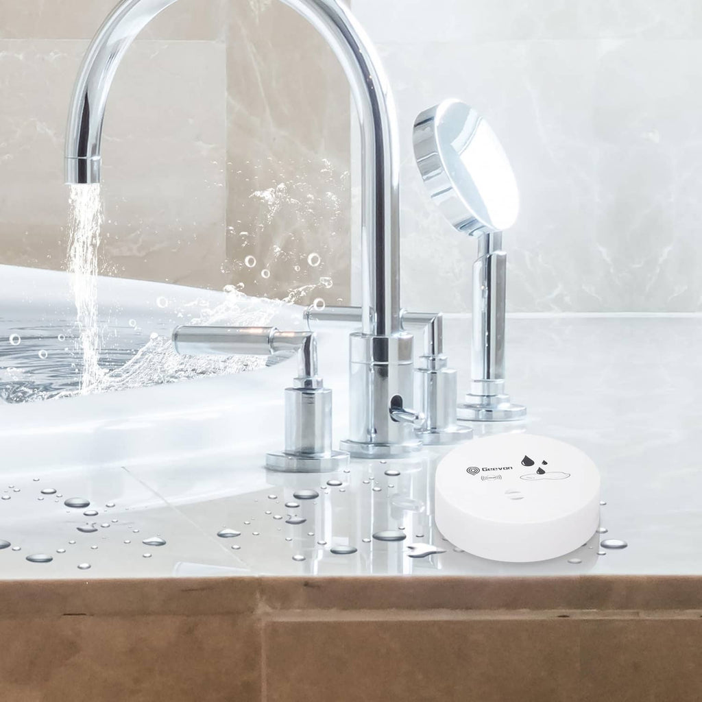 Geevon white water leak alarm on bathroom sink counter near running faucet