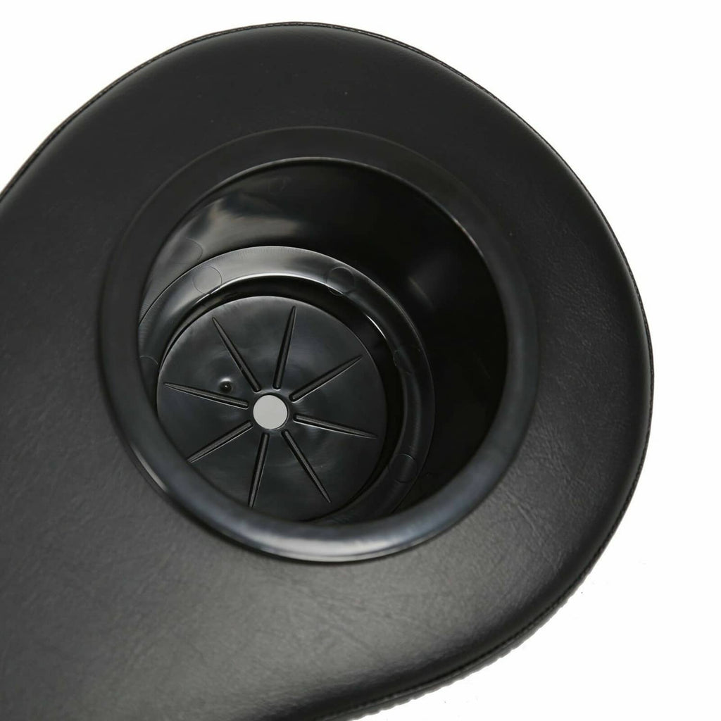 Black round cup holder insert with ridged wheel detail on golf cart arm rest