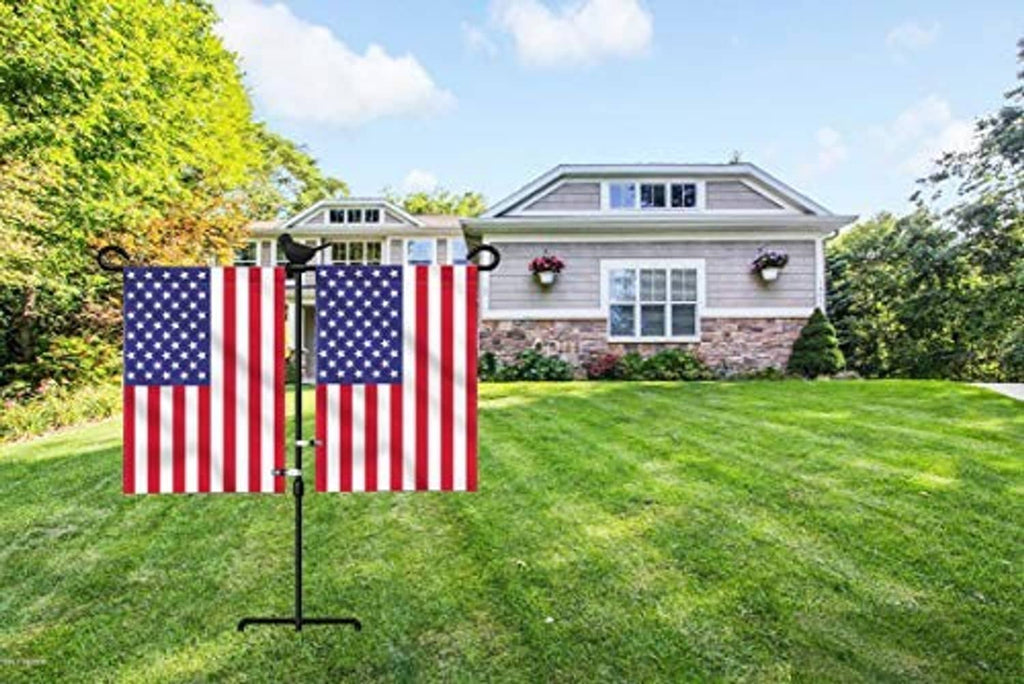 Black double garden flag stand holding two vertical American flags