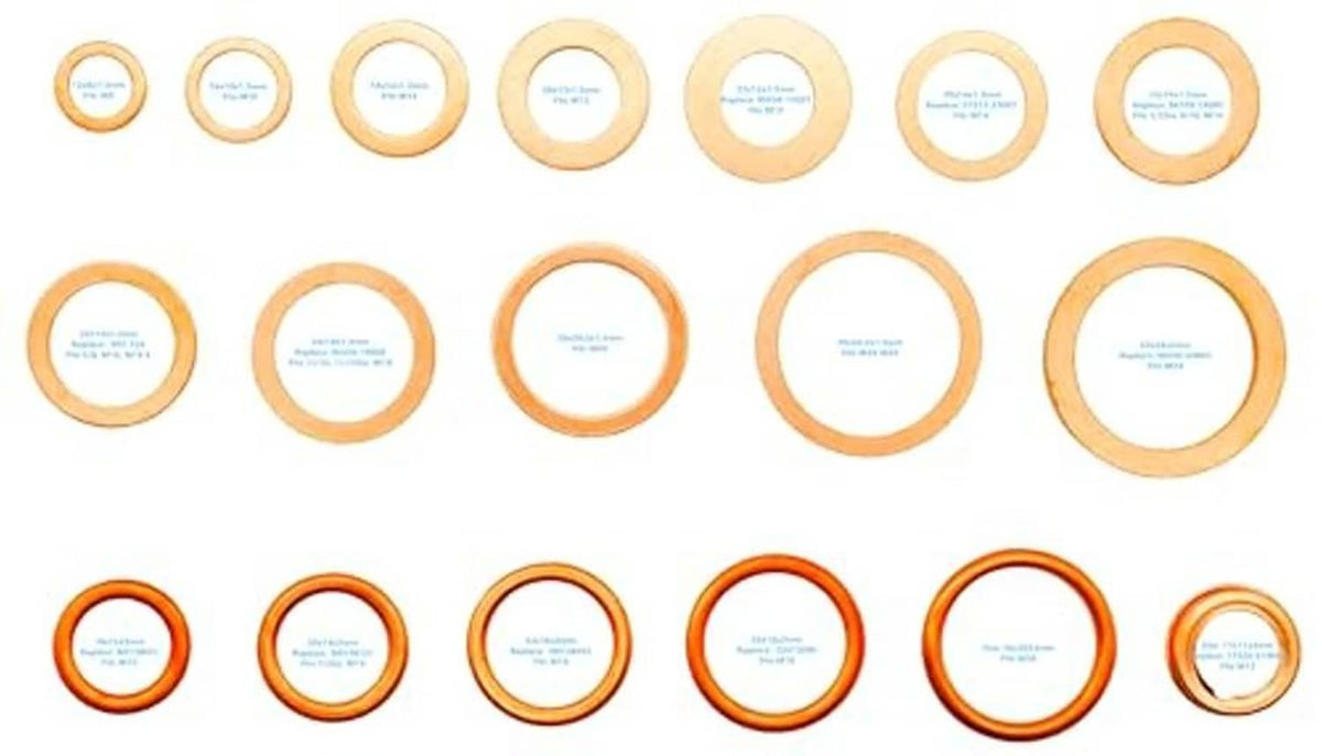 Assorted copper oil drain plug crush washers, multiple sizes laid out
