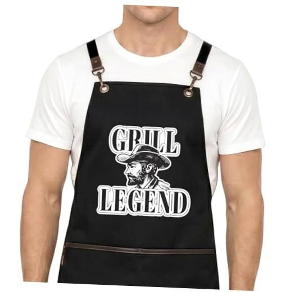 Black adjustable cross-back work apron with Grill Legend graphic and dark straps.