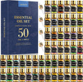 Essential oil gift set with 50 small glass bottles and blue presentation box