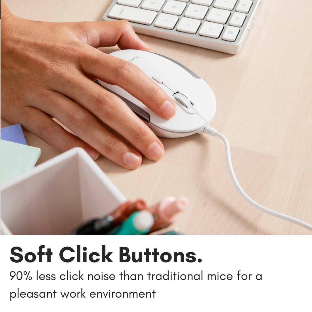 White slim wired mouse with curved sides and left-click button area under hand