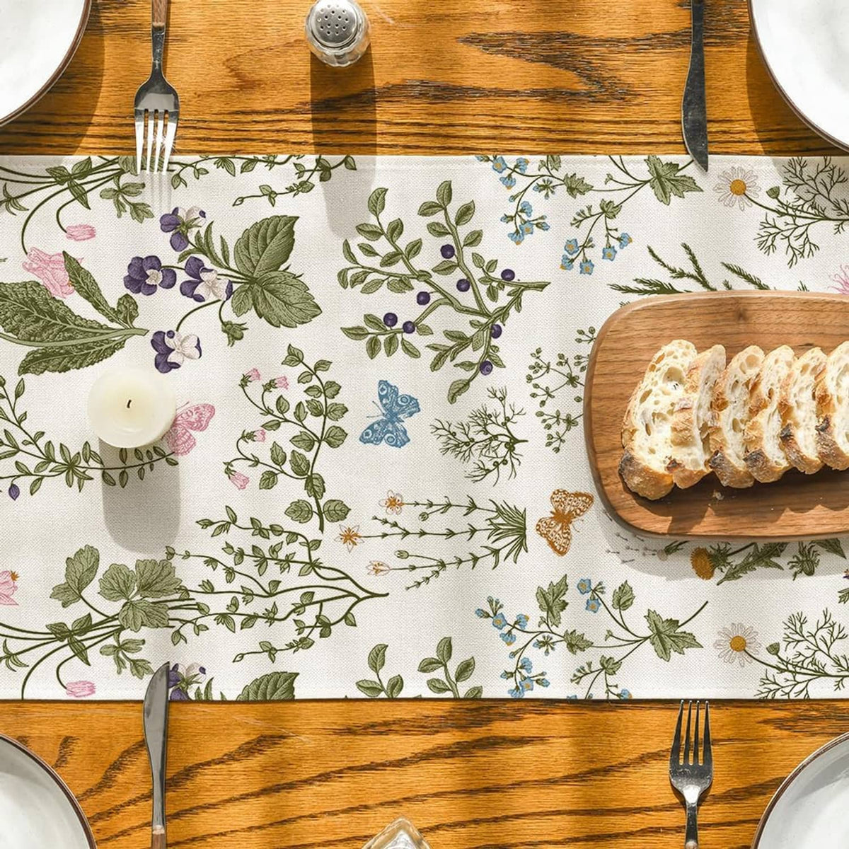 Wildflower table runner with butterfly print, placed between serving plates