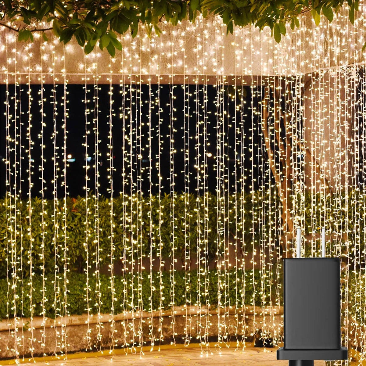 Warm white LED curtain lights with vertical dangling strands for outdoor hanging display