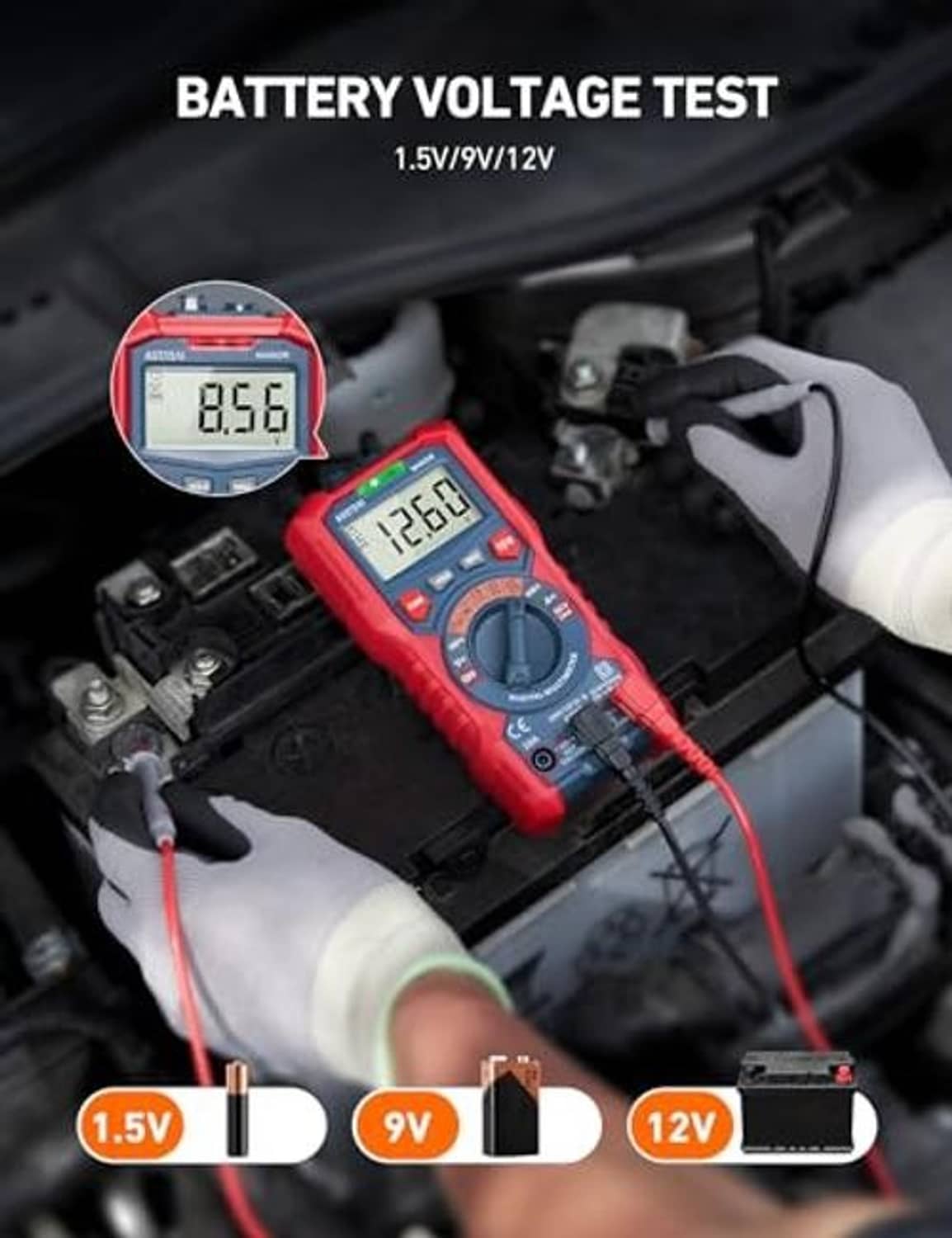 Red digital TRMS multimeter checking battery voltage with probe leads