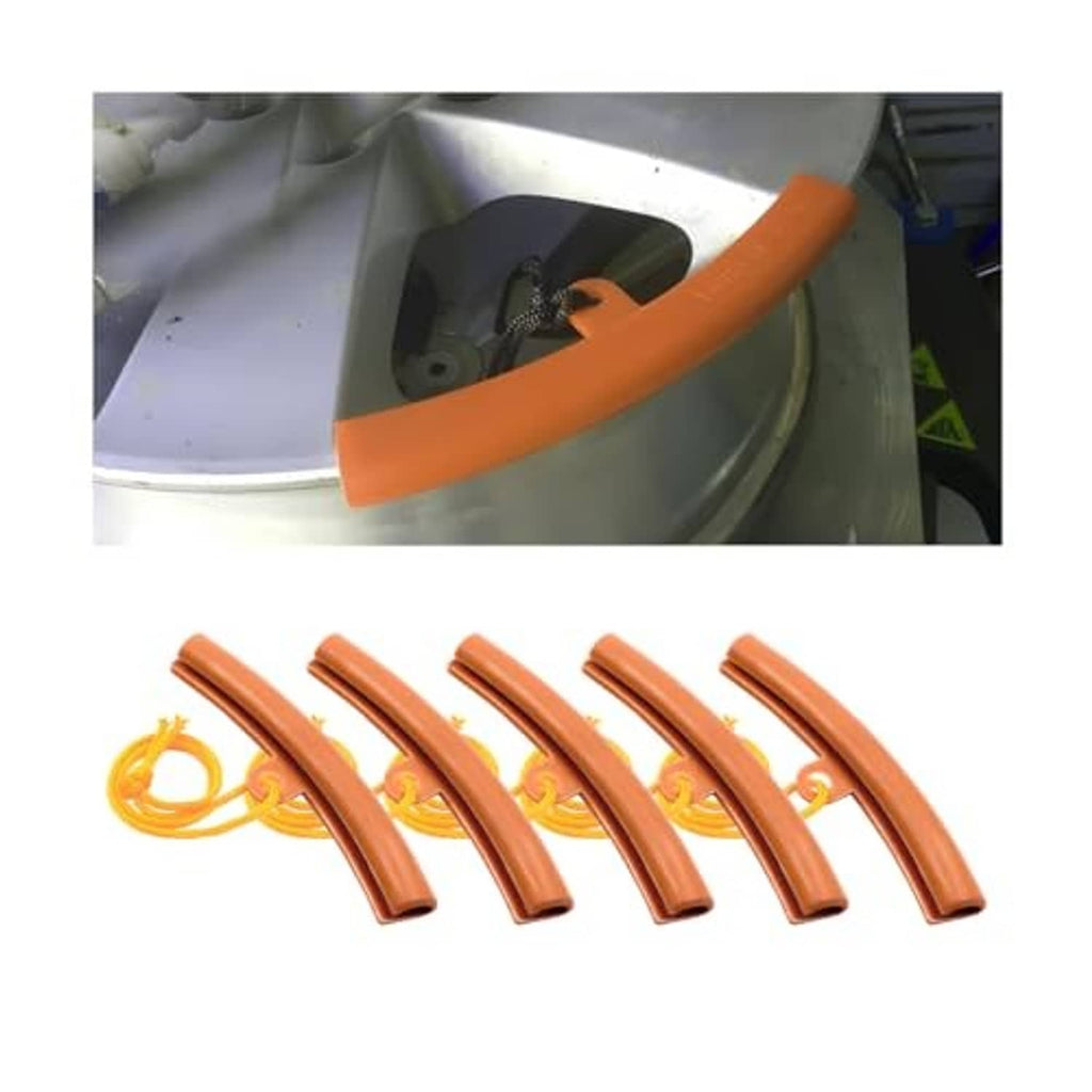 Set of five orange curved tire rim protectors with yellow pull cord.