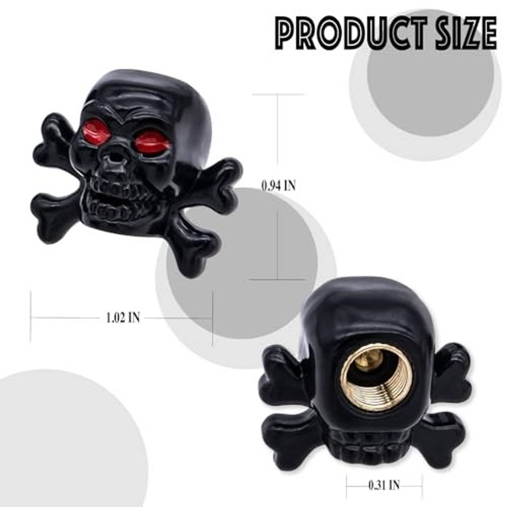 Single black skull tire valve stem cap with red eyes and brass valve opening