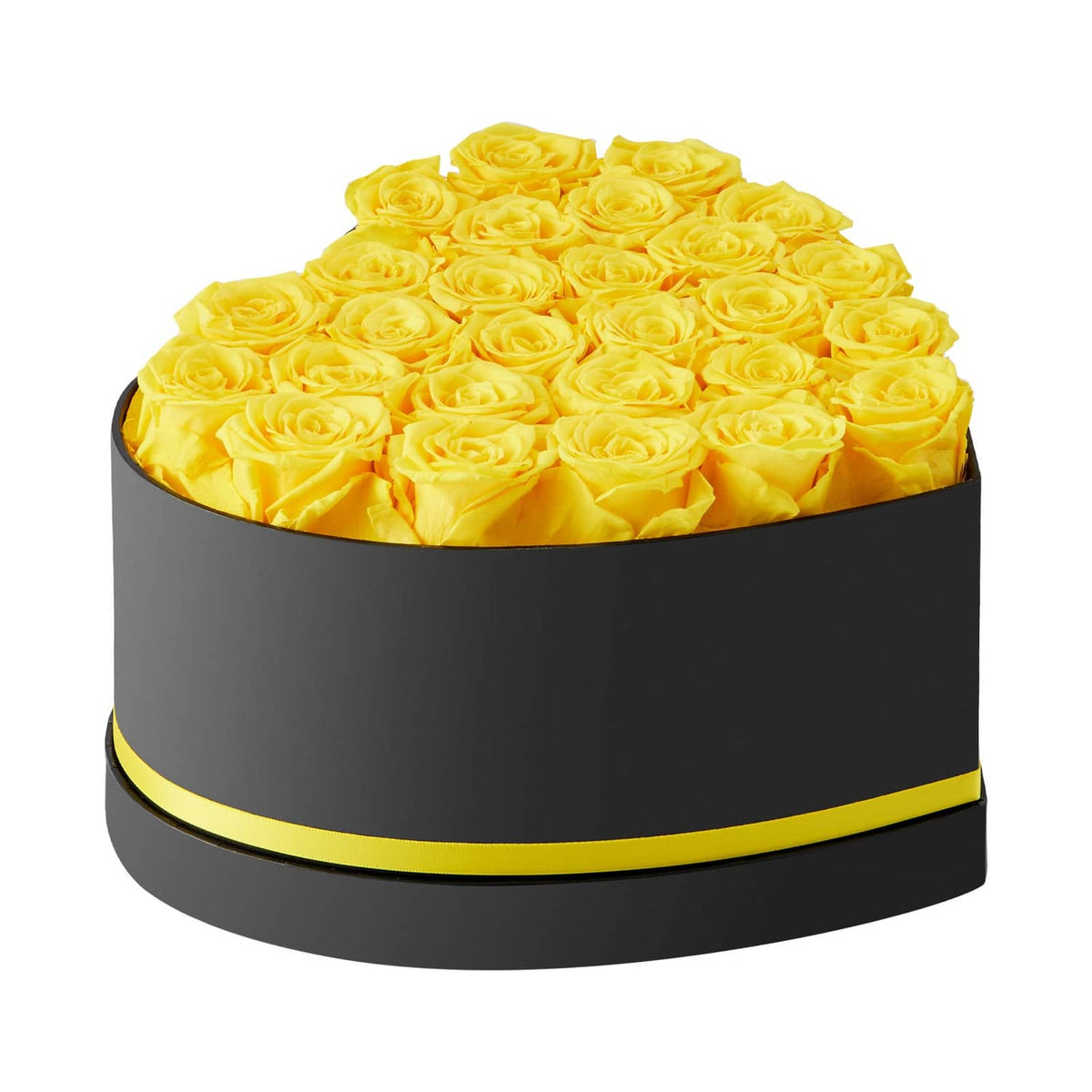 Black heart-shaped box filled with yellow preserved roses, no ribbon visible