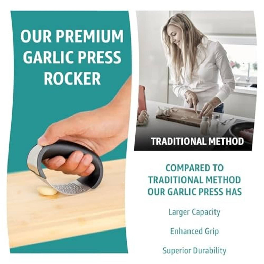 Black garlic press rocker on wooden board, stainless mesh plate visible
