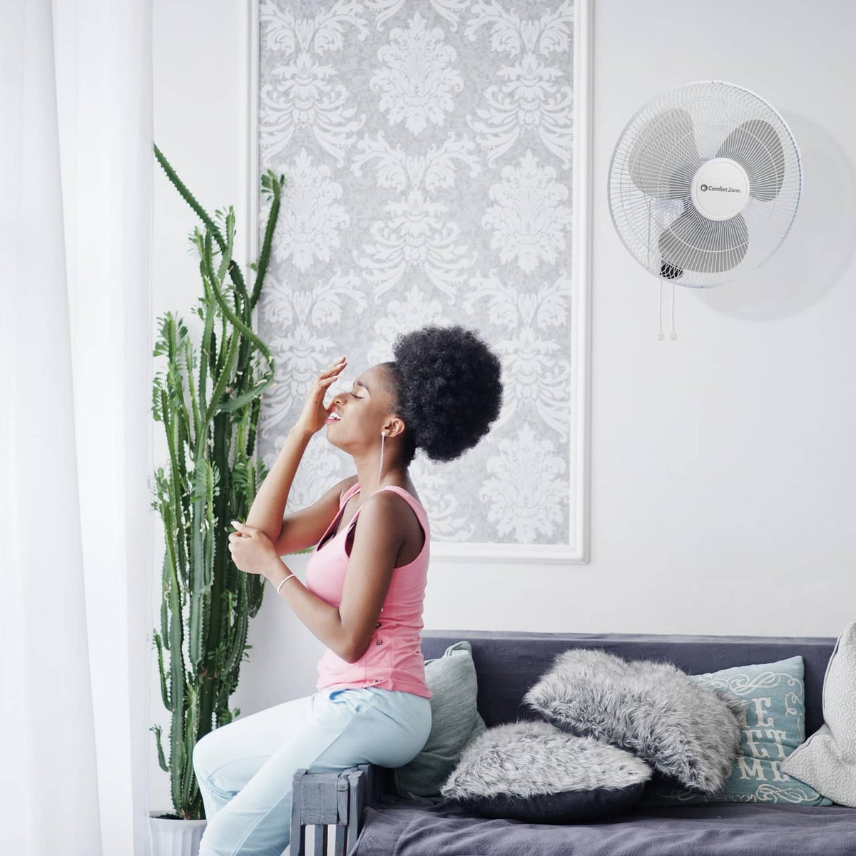 Comfort Zone wall mount fan installed on wall for quiet personal cooling