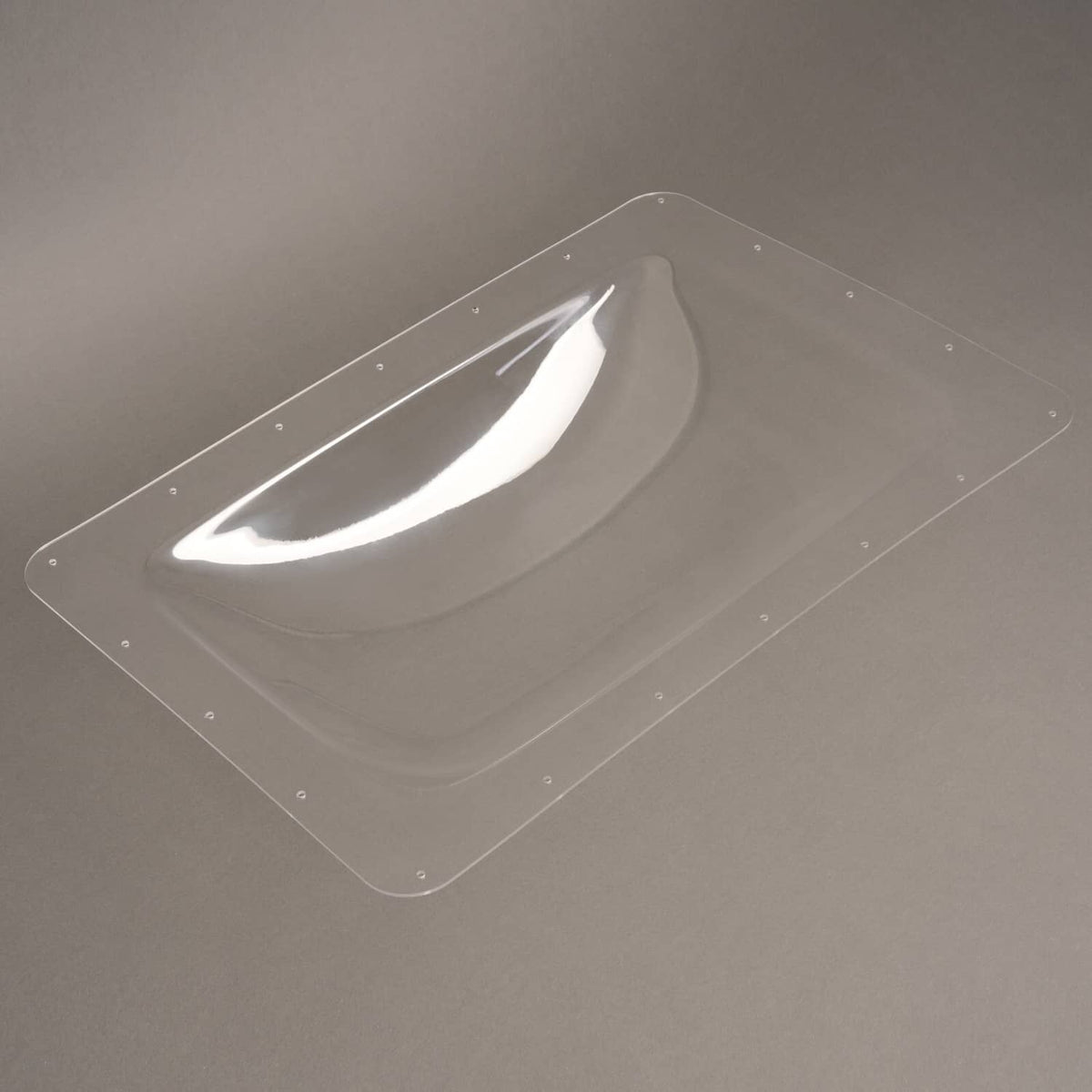 Clear dome skylight cover on RV roof, rectangular transparent panel with dome opening