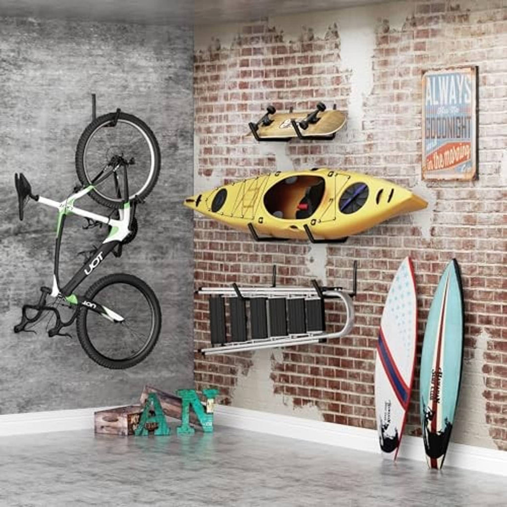 Black wall storage hooks holding a yellow kayak and surfboards in a garage