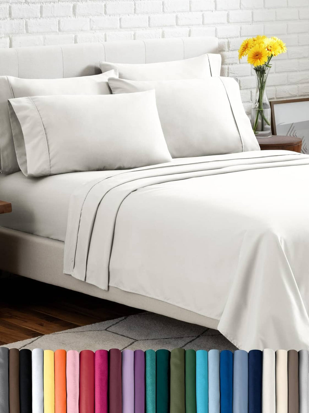 Cream microfiber bed linen set with flat sheet, fitted sheet, and pillowcases on bed