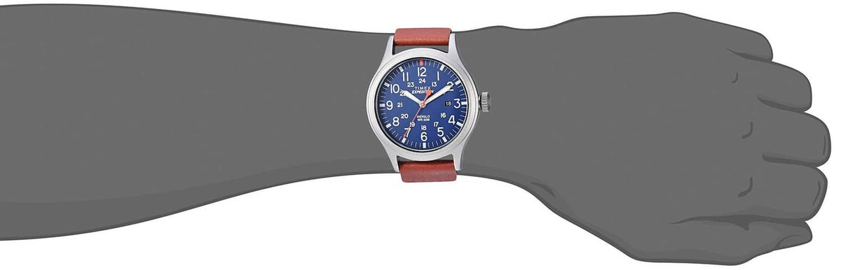 Wristwatch on wrist with blue dial and red-and-white strap